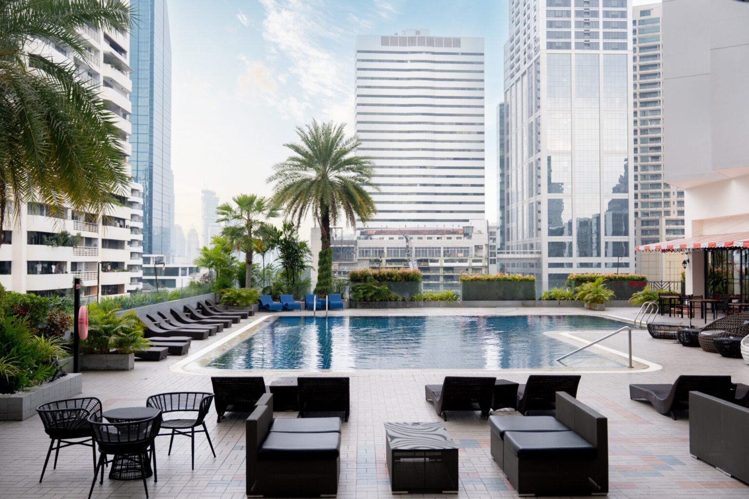 Spacious serviced apartments in Sukhumvit, ideal for long-term stays with hotel facilities, BTS access, and family-friendly benefits.