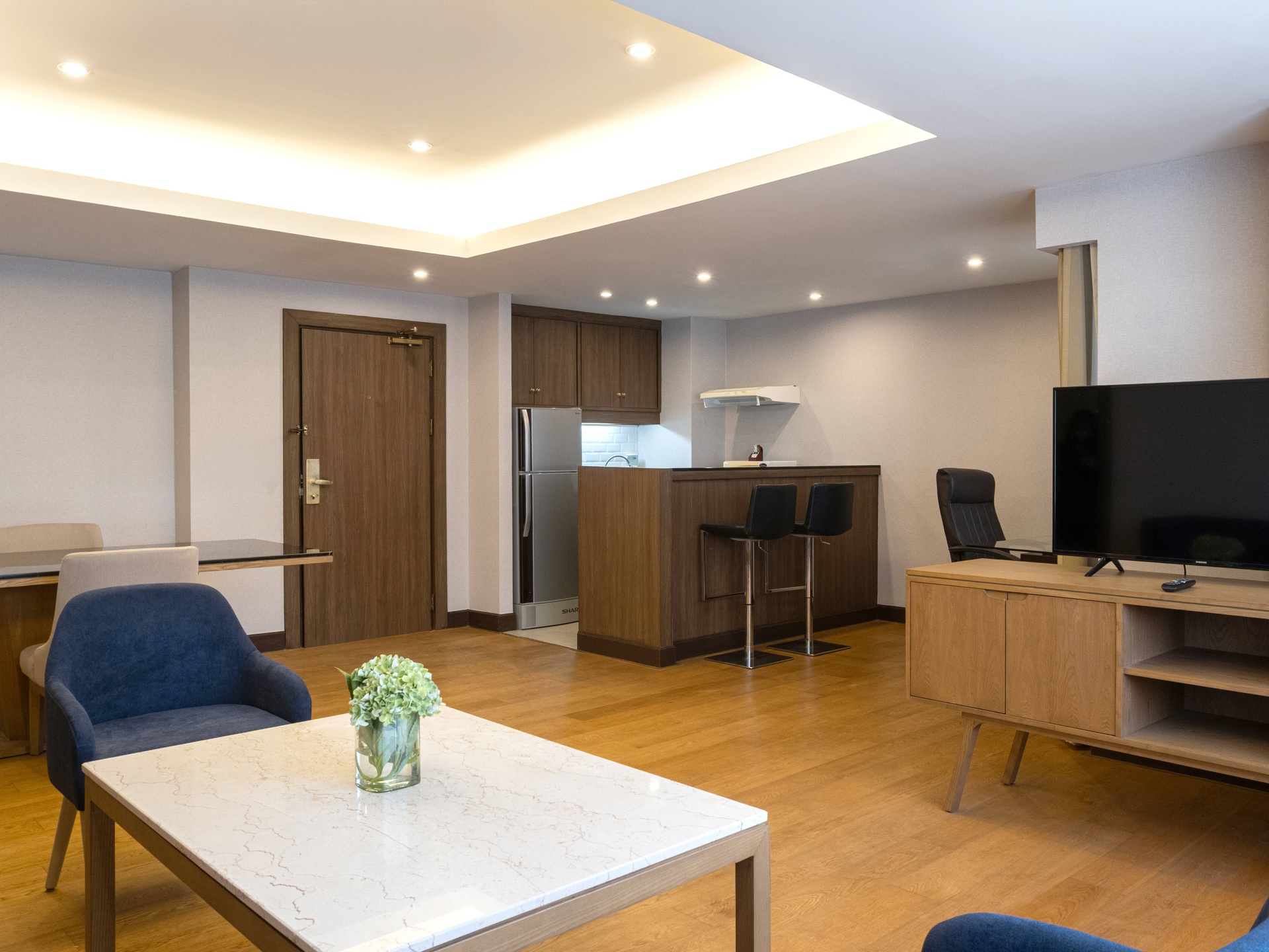 Spacious serviced apartments in Sukhumvit, ideal for long-term stays with hotel facilities, BTS access, and family-friendly benefits