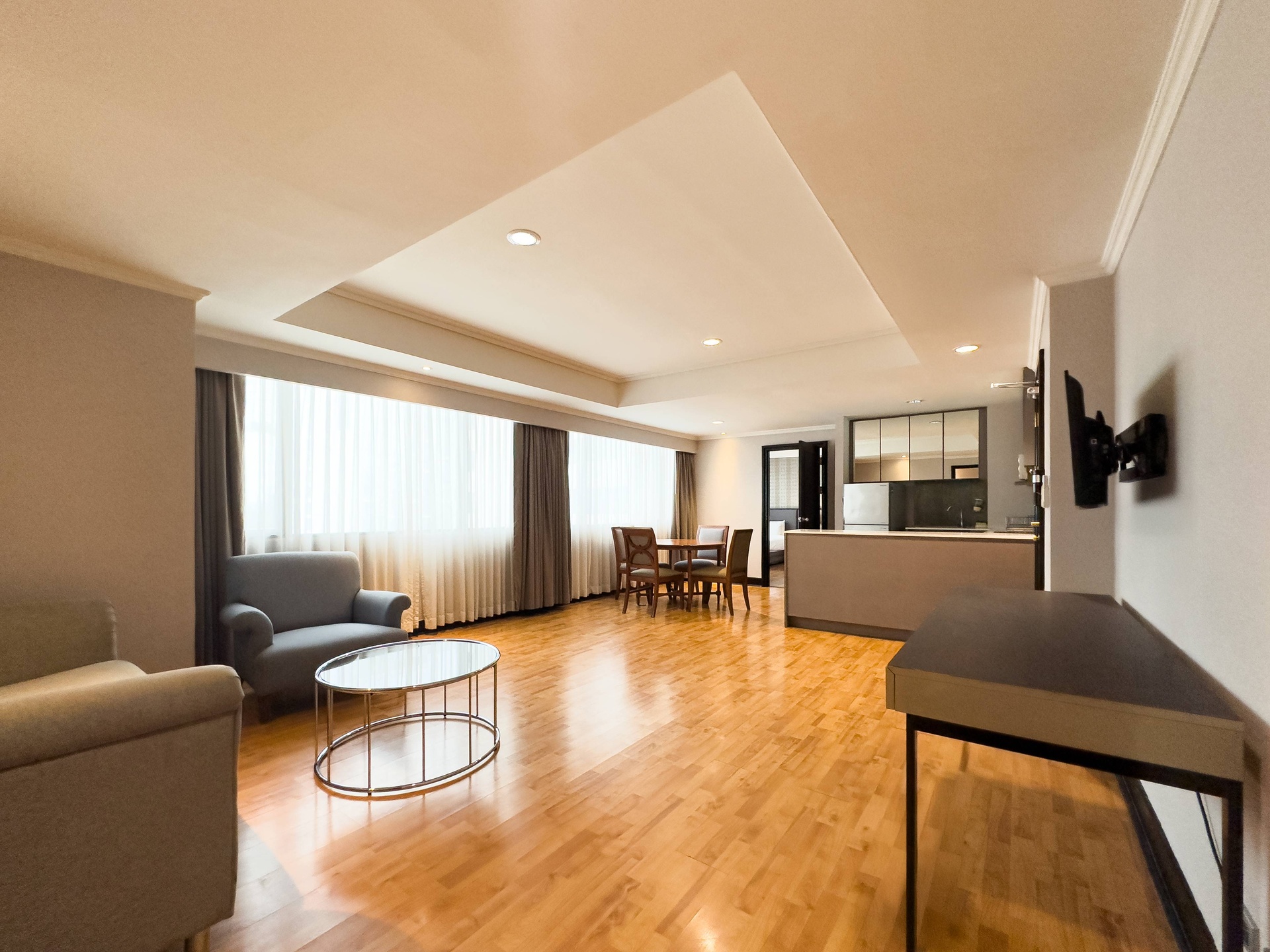 Spacious serviced apartments in Sukhumvit, ideal for long-term stays with hotel facilities, BTS access, and family-friendly benefits