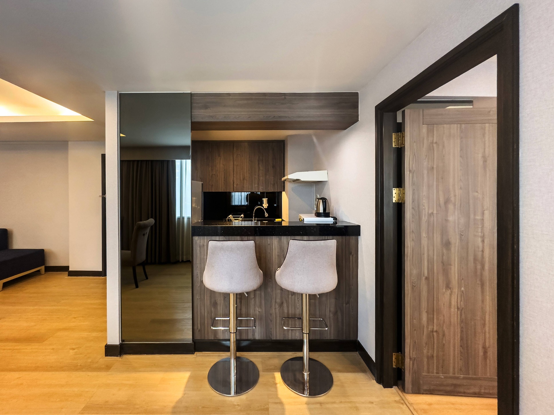 Spacious serviced apartments in Sukhumvit, ideal for long-term stays with hotel facilities, BTS access, and family-friendly benefits