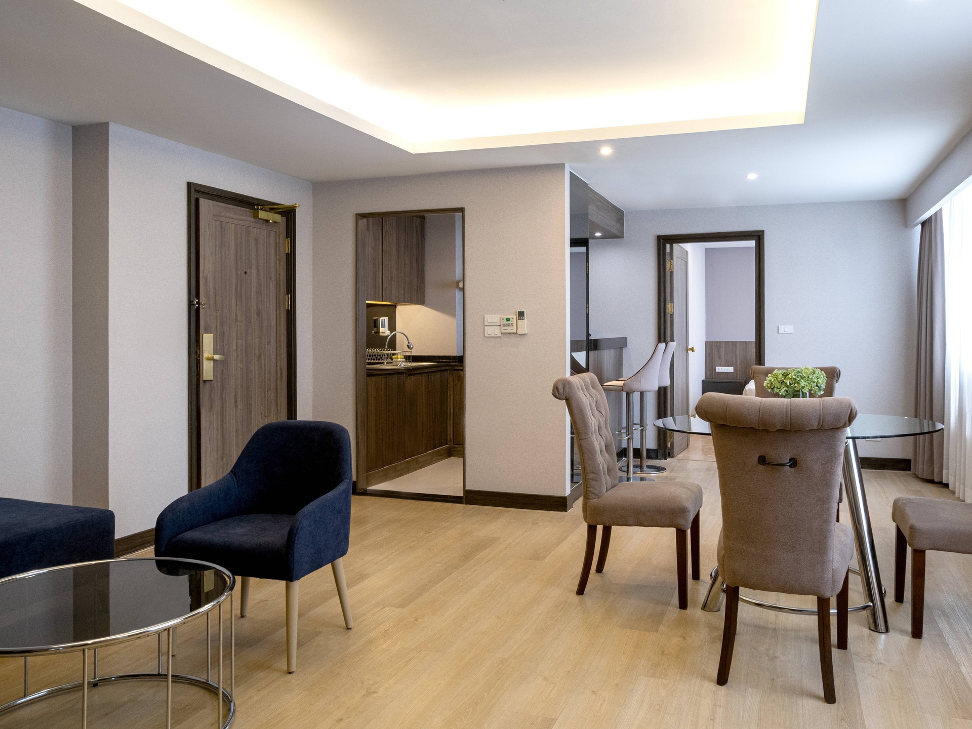 Spacious serviced apartments in Sukhumvit, ideal for long-term stays with hotel facilities, BTS access, and family-friendly benefits