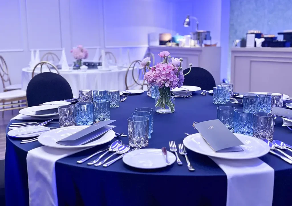 Wedding reception tables at Rembrandt Hotel Bangkok Sukhumvit with floral decorations