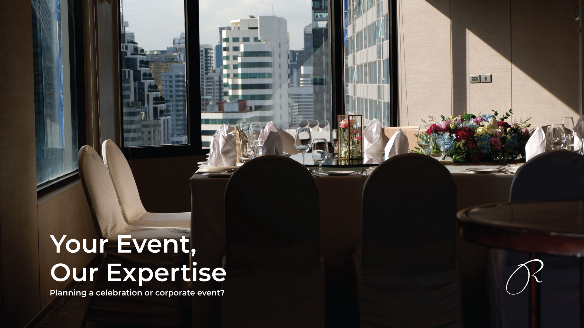 Elegant table setup with floral centrepiece and glassware at Rembrandt Hotel Sukhumvit, ideal for weddings, celebrations, and corporate events.