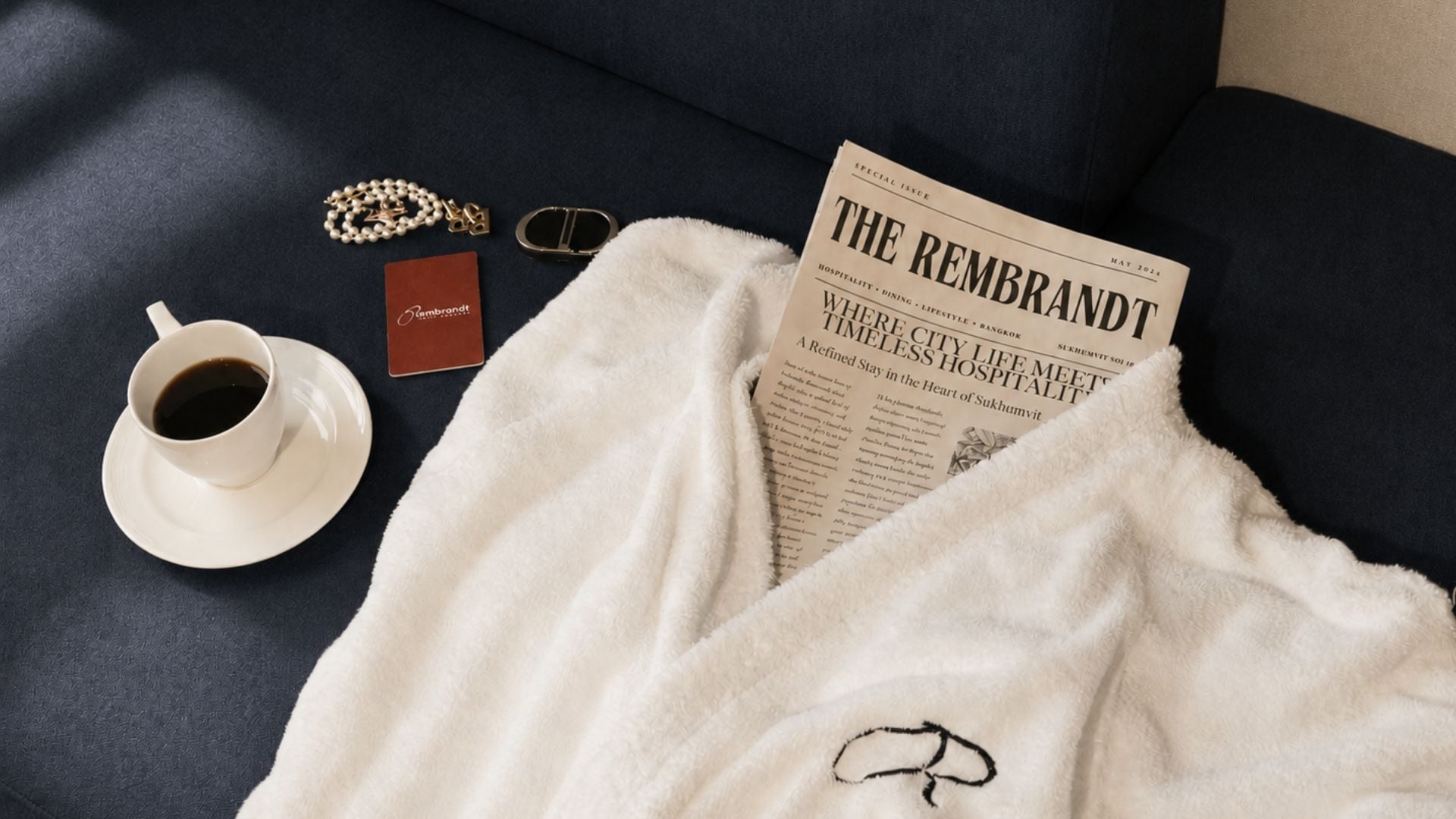 Stylish morning coffee and newspaper experience at Rembrandt Bangkok hotel room